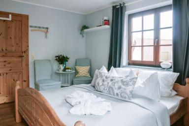 Eines unserer gemütlichen Gästezimmer